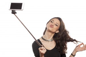 lady with a selfie stick yuck